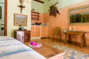 Finca Can Duvai_Superior_Garten_Apartment_Pastellzimmer_Küche+Esstisch.webp